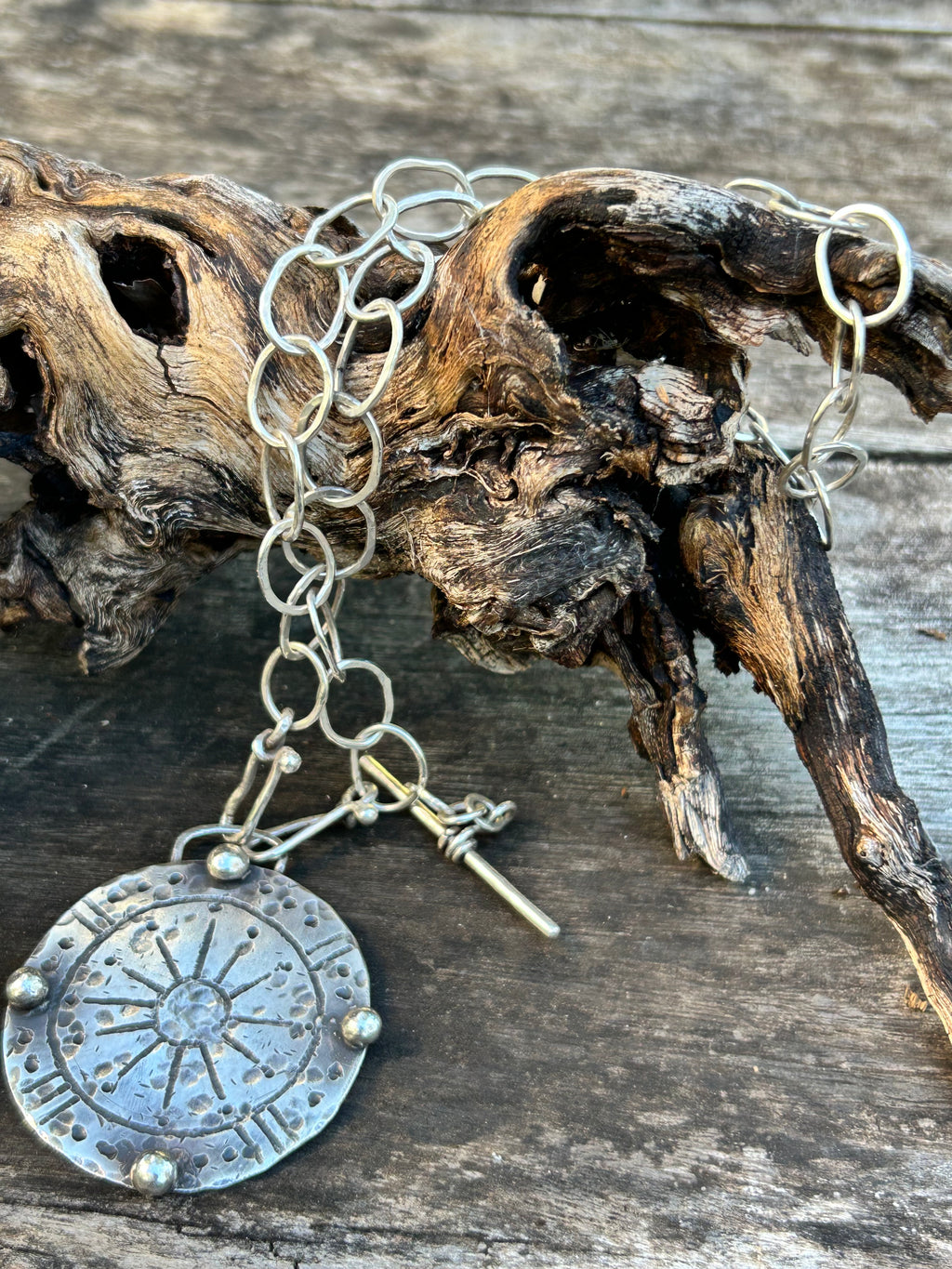Sun Toucher Shield Pendant